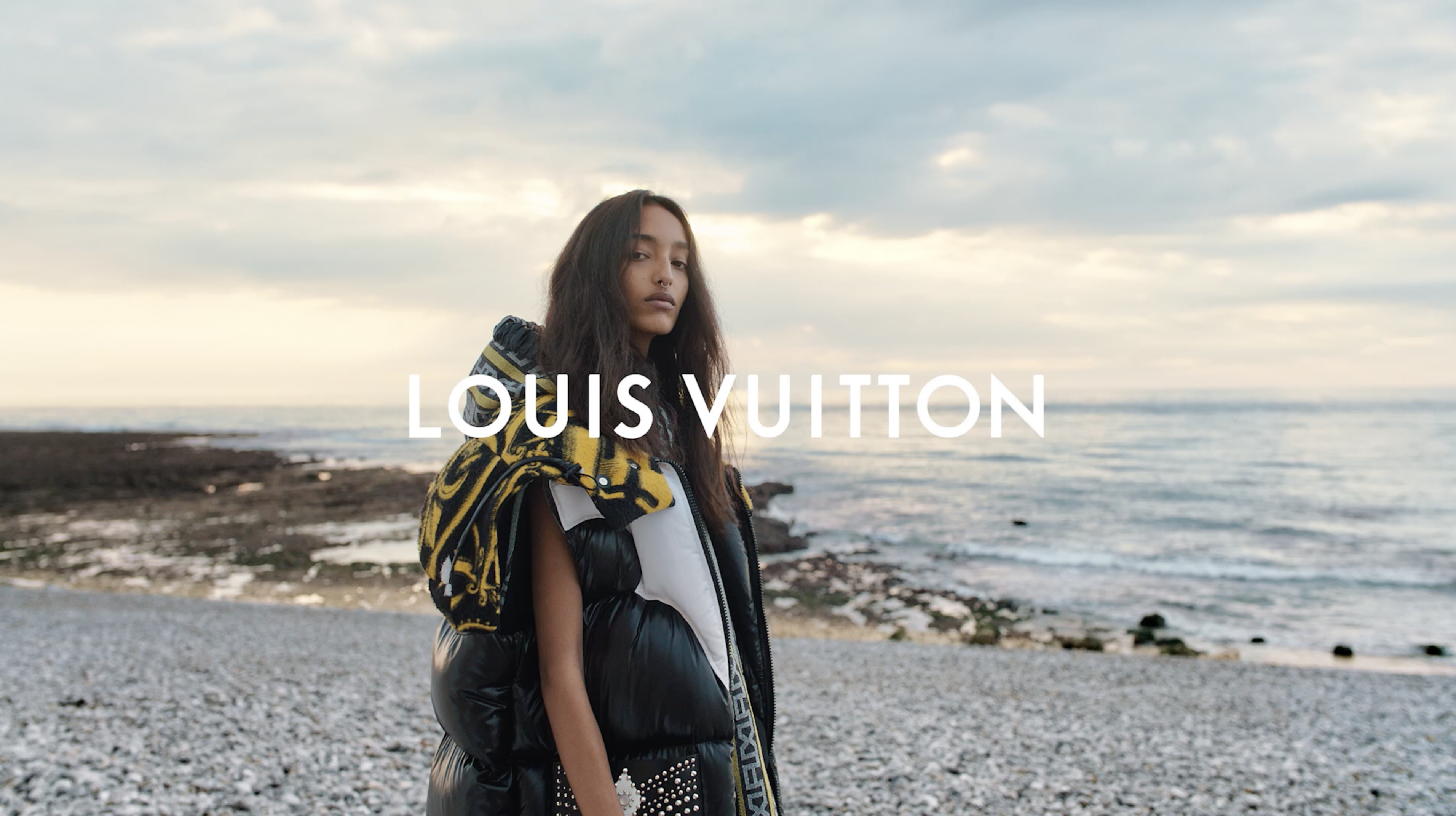 poster advertising Louis Vuitton handbag in paper magazine from