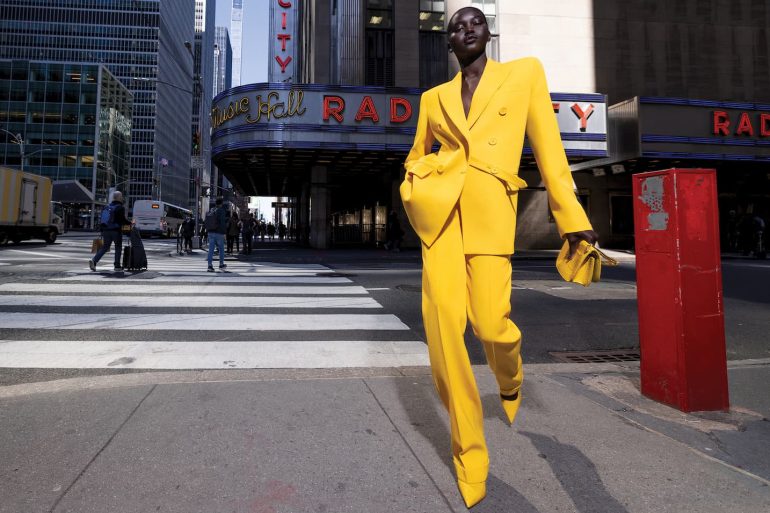 Michael Kors Fall 2022 ad campaign photo with Adut Akech