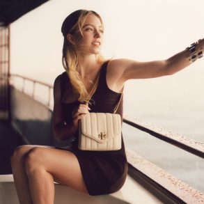 Tory Burch Kira bag fall 2022 ad campaign photo with Sydney Sweeney