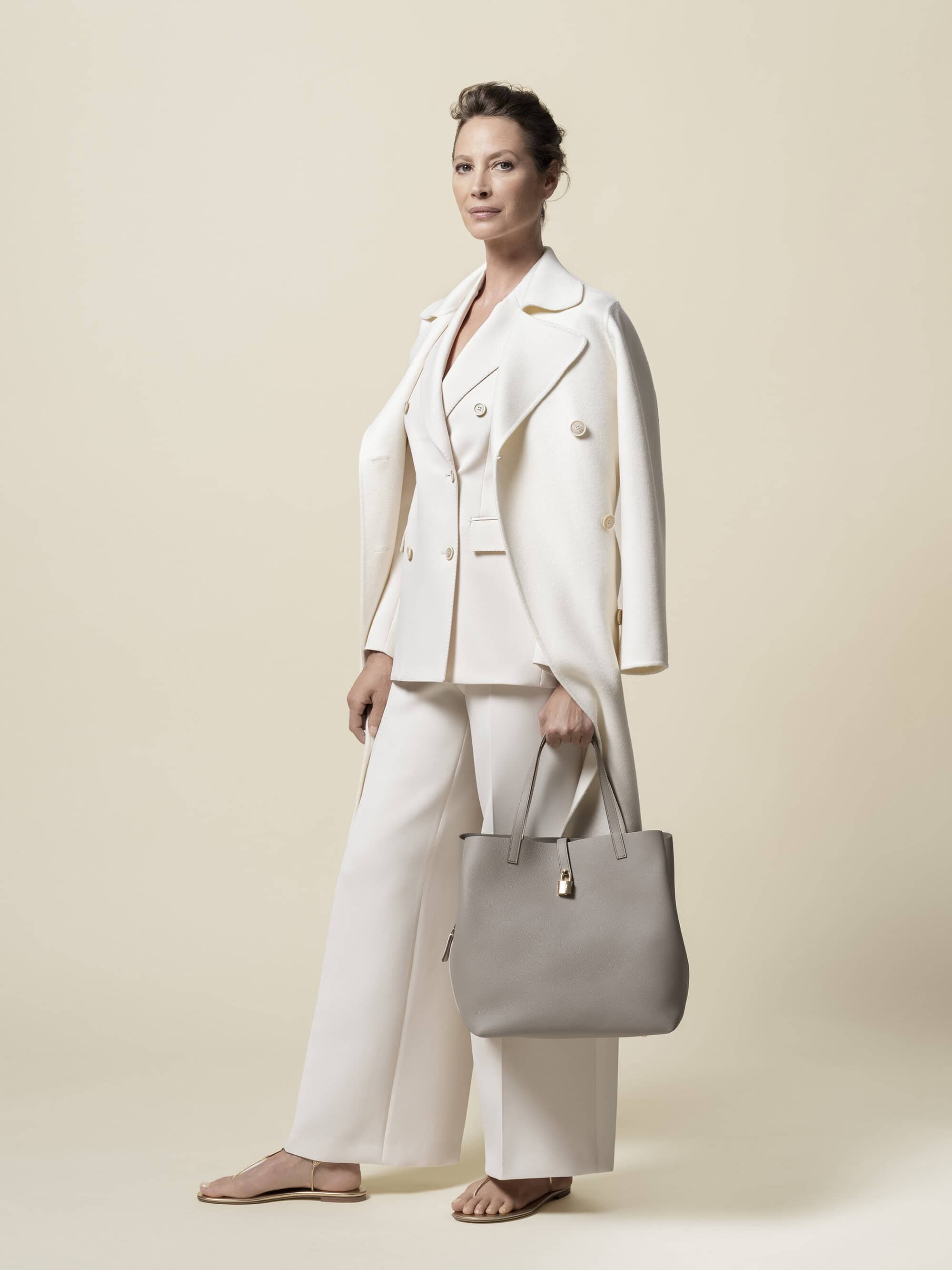 Christy Turlington Models in CH Carolina Herrera Handbag Ad