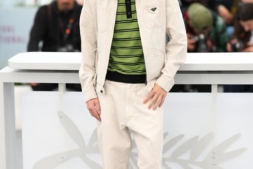 Filippo Scotti wore Prada while attending "Le città di pianura" photocall at the 78th Cannes Film Festival