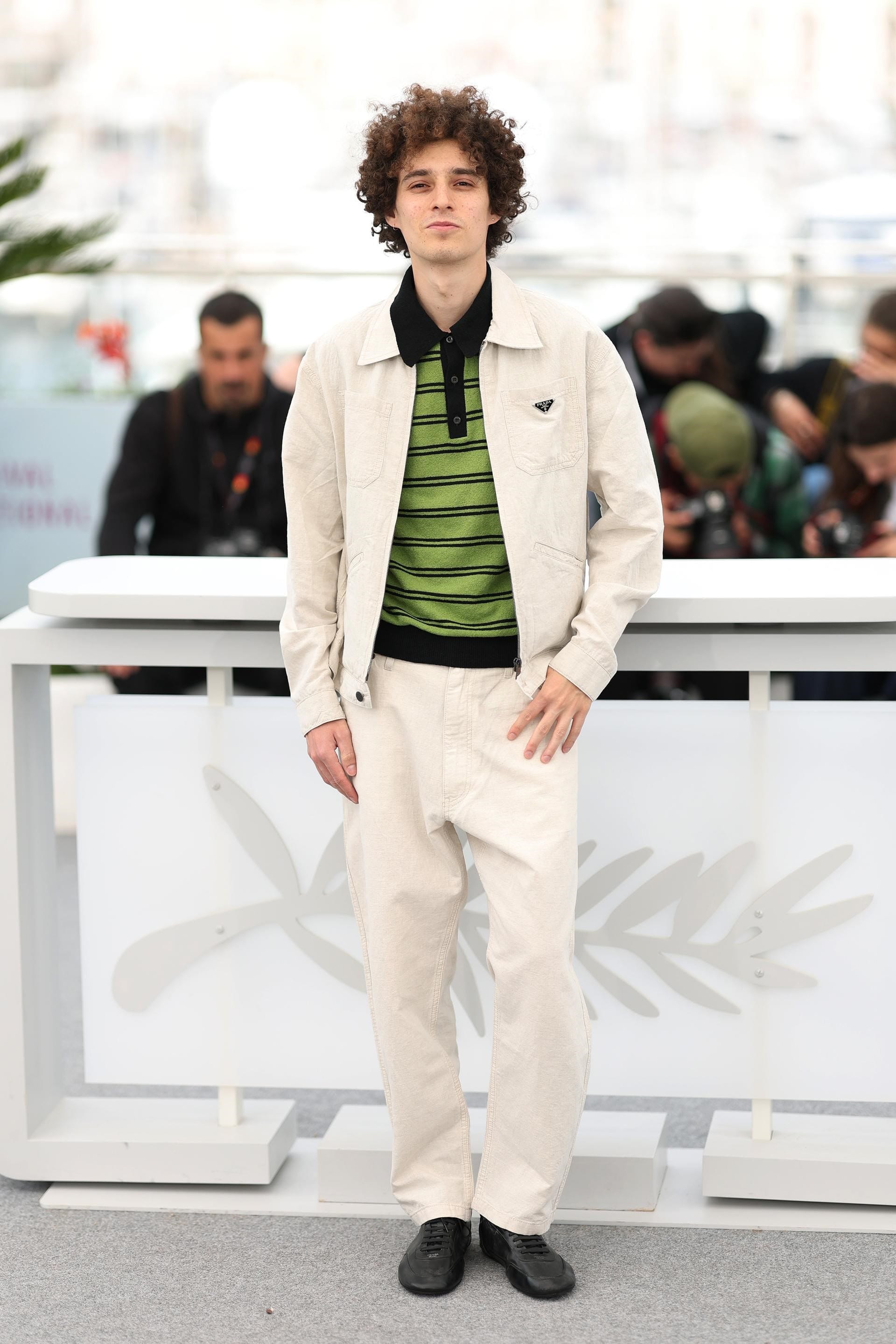 Filippo Scotti wore Prada while attending "Le città di pianura" photocall at the 78th Cannes Film Festival
