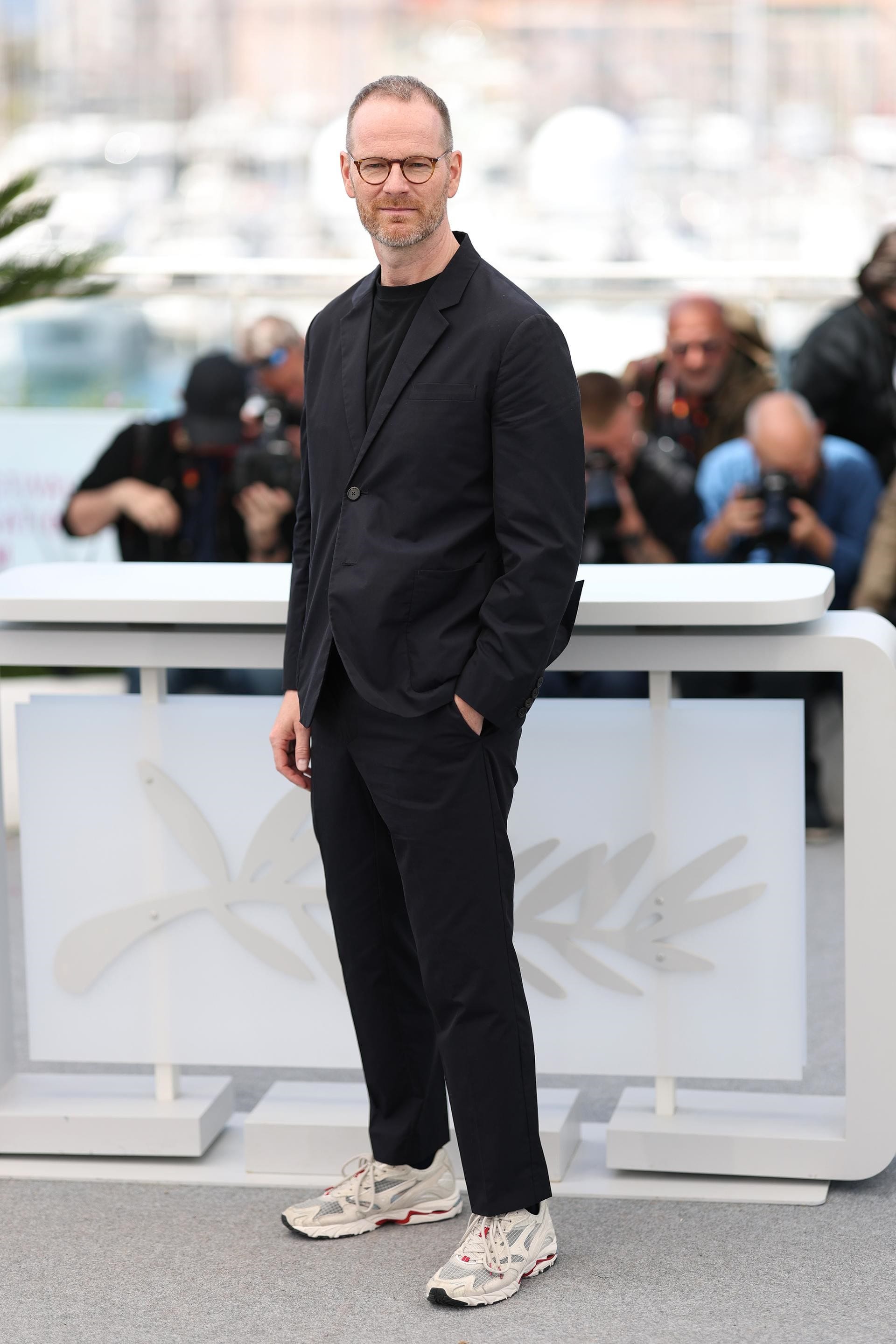 Joachim Trier wore Prada while attending "Sentimental Value" photocall at the 78th Cannes Film Festival