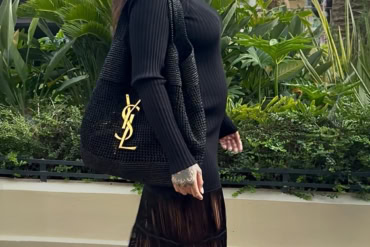 Rihanna with Saint Laurent Handbag at 78th Cannes Film Festival