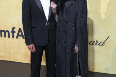 Andrea Riseborough & Karim Saleh in McQueen at the amfAR Gala in Cannes