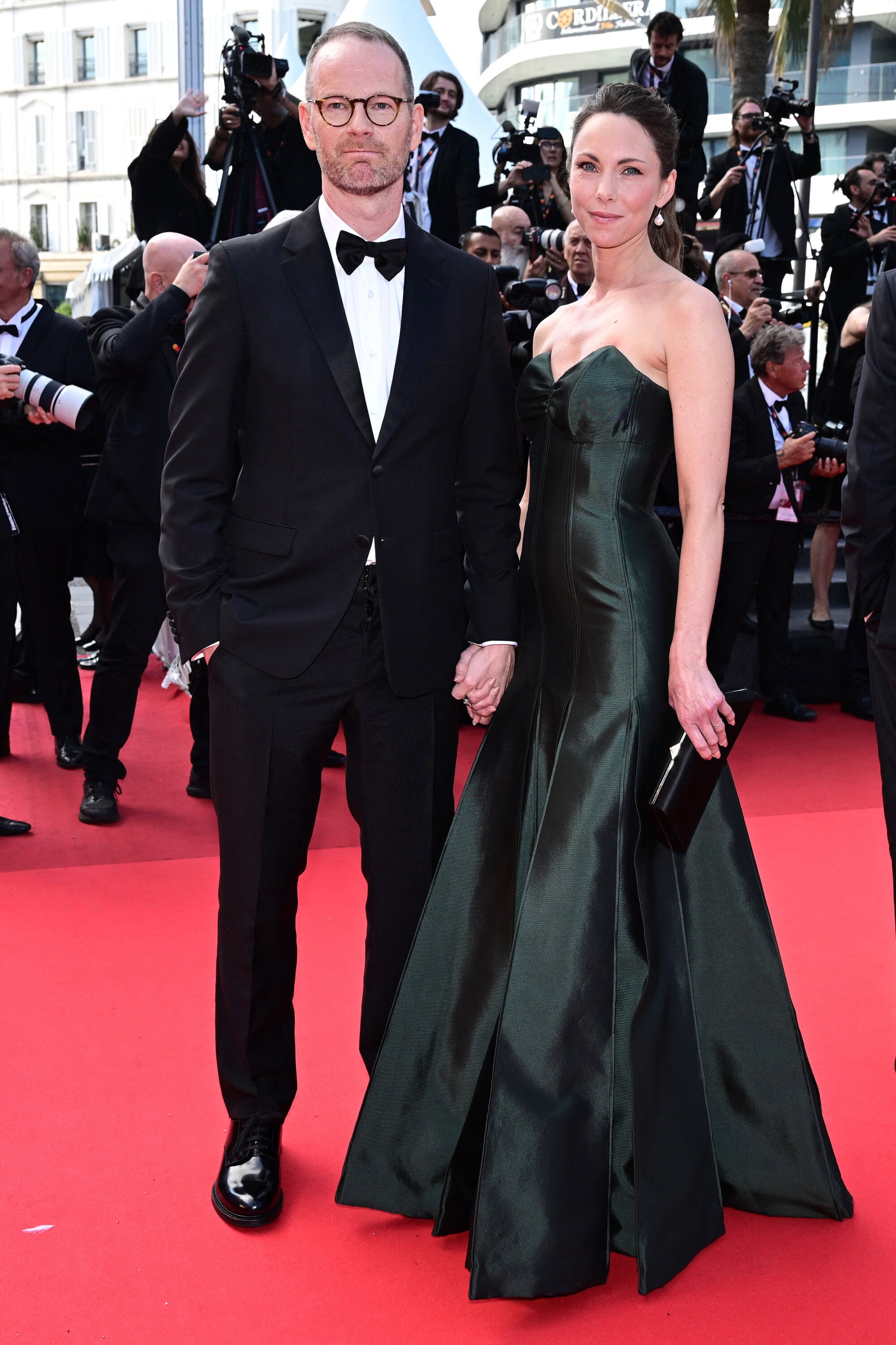 Joachim Trier and Helle Bendixen Trier in Prada at 78th Cannes Film Festival