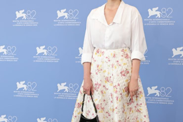 Greta Gerwig in Prada at the "Jay Kelly" photocall during the 82nd Venice Film Festival
