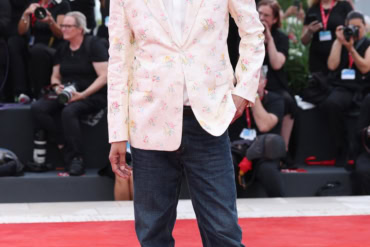 Luca Guadagnino in Dior at the "After the Hunt" red carpet during the 82nd Venice Film Festival