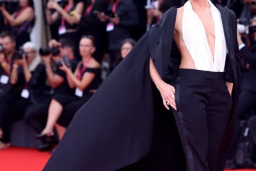 Noomi Rapace wears McQueen at the 82nd Venice Film Festival