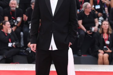 Will Price in Dior at the "After the Hunt" red carpet during the 82nd Venice Film Festival
