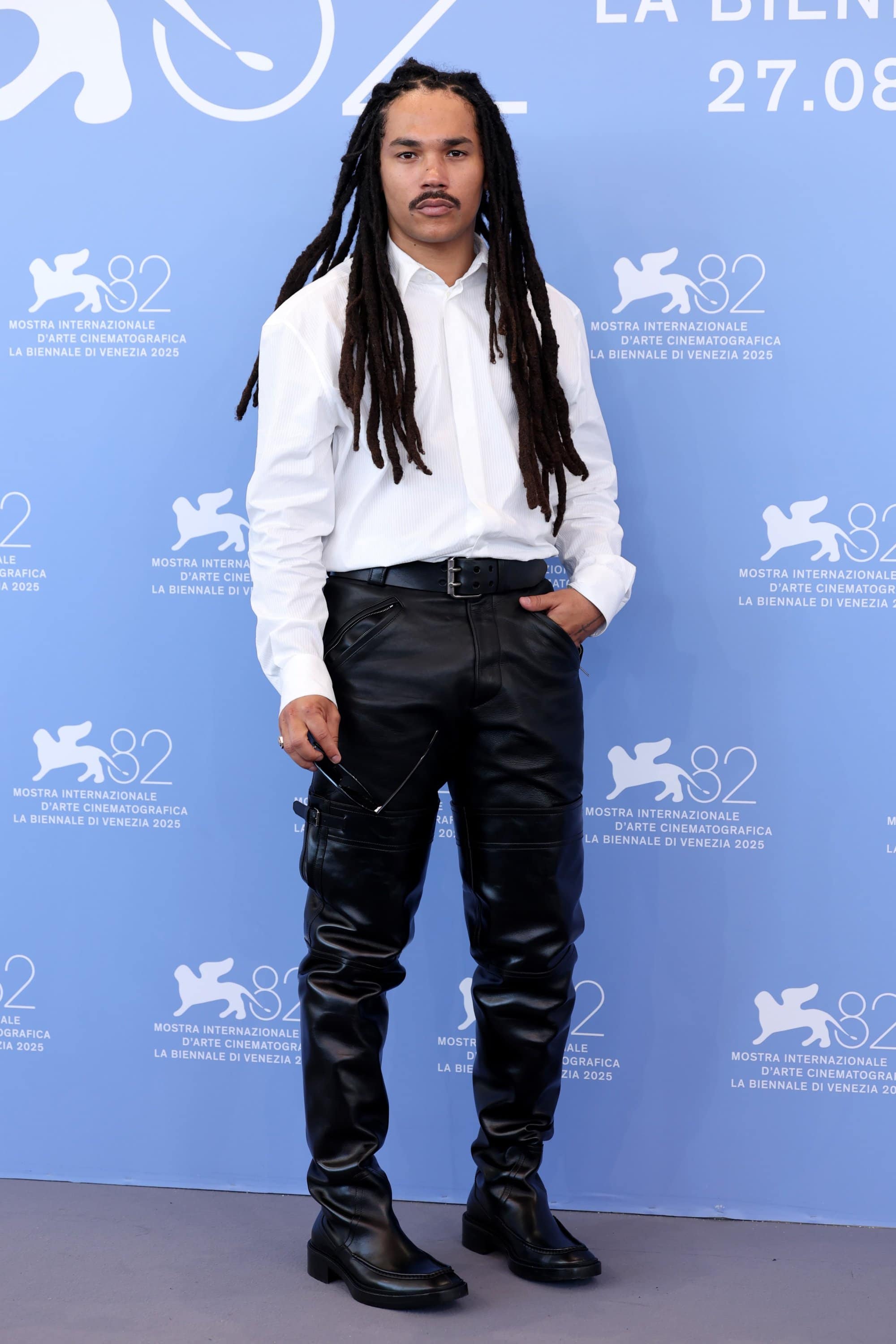 Luka Sabbat in Saint Laurent by Anthony Vaccarello at "Father Mother Sister Brother" photocall - 82nd Venice Film Festival