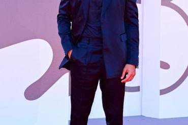 Christopher Abbott in Prada at "The Testament Of Ann Lee" red carpet - 82nd Venice Film Festival