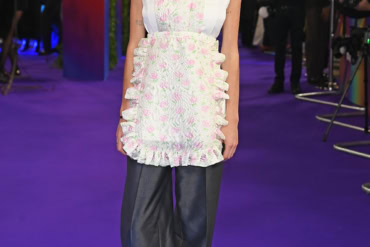 Emma Corrin wears Miu Miu to the '100 Nights of Hero' premiere at the 69th BFI London Film Festival