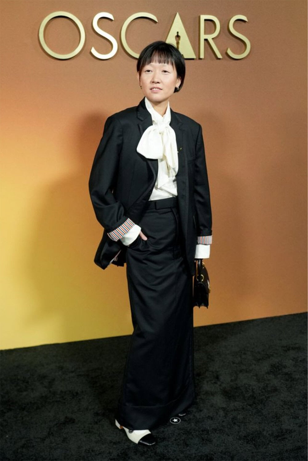 Celine Song wears Thom Browne to The 16th Governors Awards