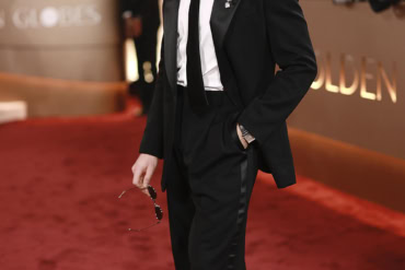 Connor Storrie in Saint Laurent to The 83rd Golden Globes