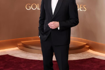 Joachim Trier in Prada to The 83rd Golden Globes Awards