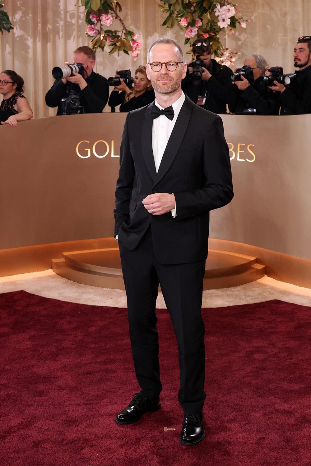 Joachim Trier in Prada to The 83rd Golden Globes Awards