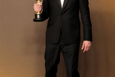 Joachim Trier in Prada while attending the 98th Academy Awards