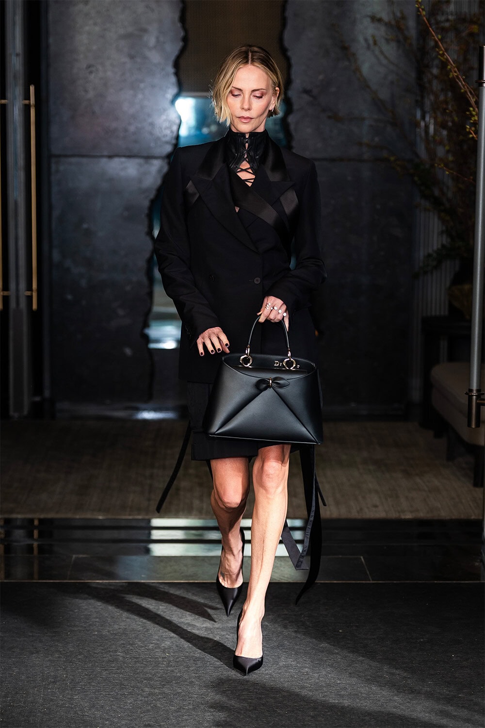 Charlize Theron wears Dior During Press in New York