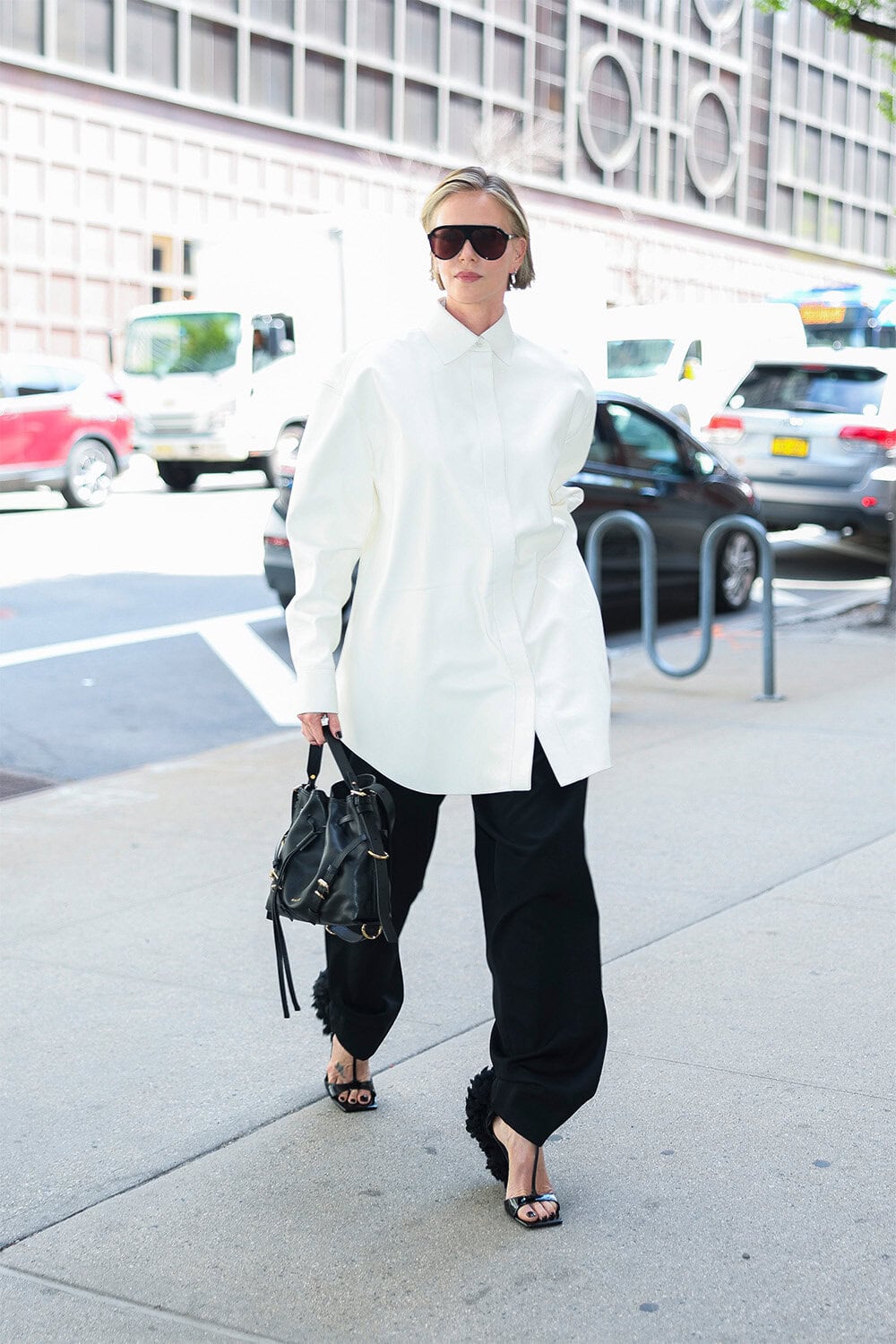 Charlize Theron wears Givenchy at Apex Promotional Tour