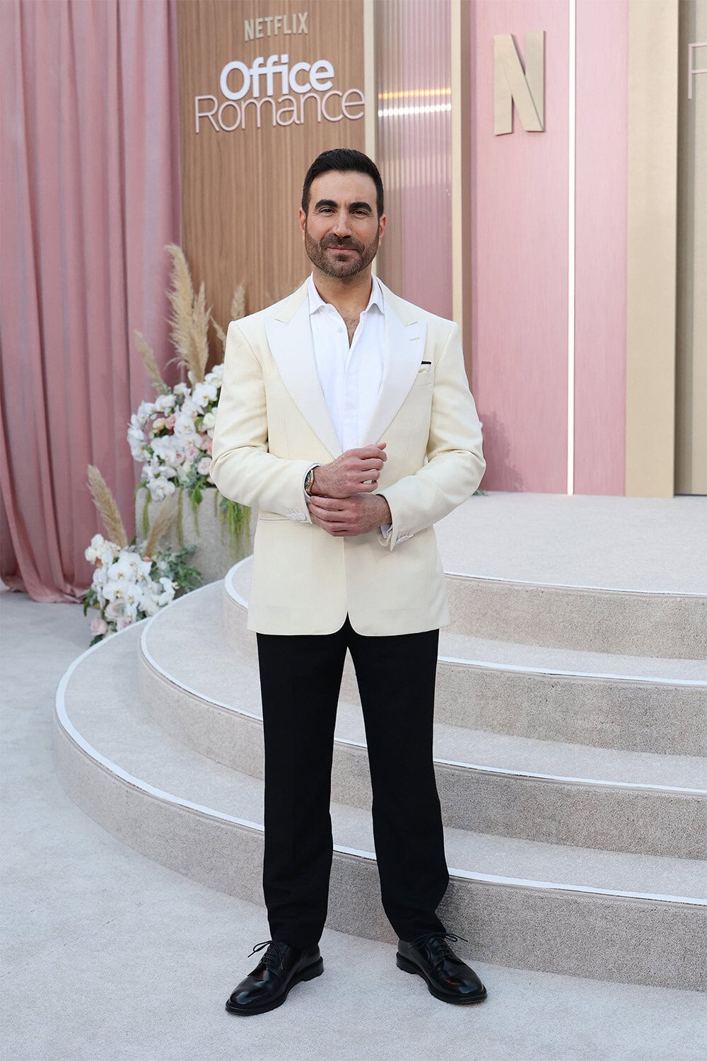 Brett Goldstein wears Dunhill at The World Premiere of Netflix's ‘Office Romance’