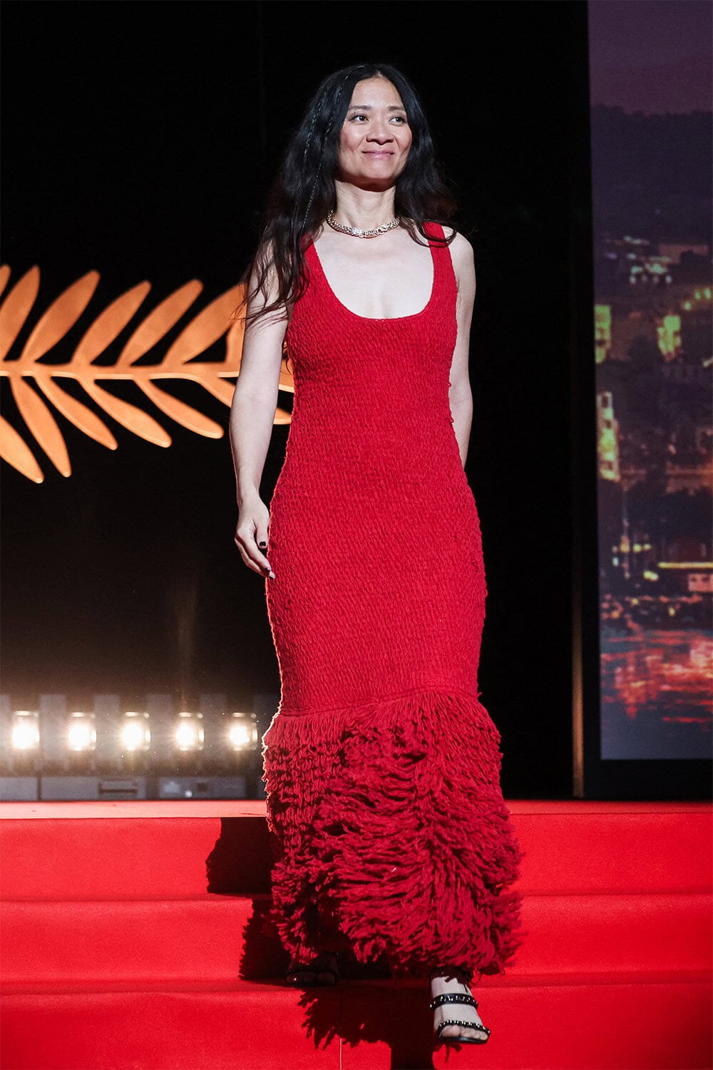 Chloe Zhao wears Gabriela Hearst at The 79th Annual Cannes Closing Ceremony