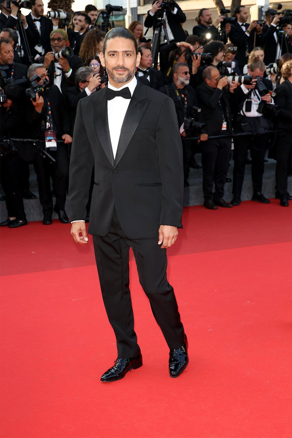 Salim Kechiouche wears Berluti at Closing ceremony of the 79th Cannes Film Festival