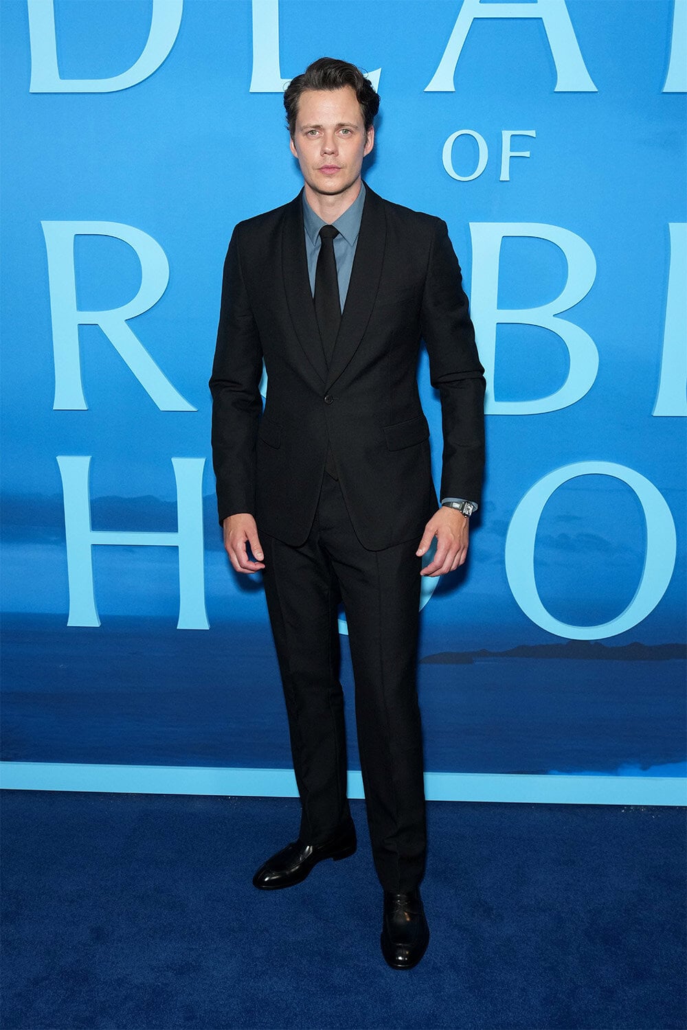Bill Skarsgård wears Prada at The premiere of "The Death of Robin Hood" in New York