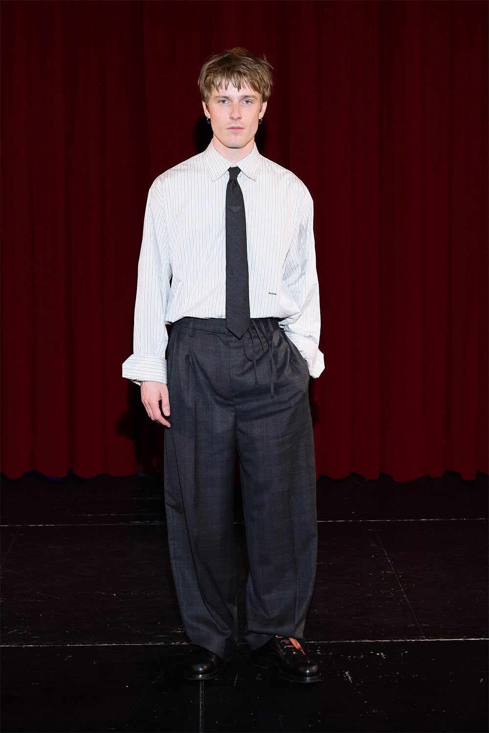 Louis Hofmann wears Prada at The "23 000 Leben" premiere
