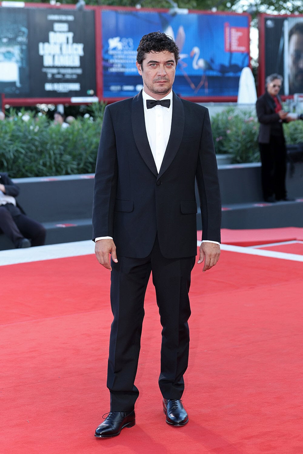 Riccardo Scamarcio wears Prada at the 83rd Venice International Film Festival closing ceremony